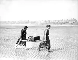 Fisherwomen of New Biggin England carrying their catch Women fulfilling Mens work Fisherwomen of New Biggin England carrying their catch Women fulfilling Mens work