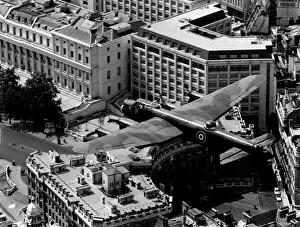 The last flying RAF Lancaster bomber over Admiralty Arch at the start of the mall in The last flying RAF Lancaster bomber over Admiralty Arch at the start of the mall in