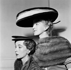 Images Dated 21st March 2013: The Flying Saucer hat Hat fashions, July 1955 Ronald Patterson show
