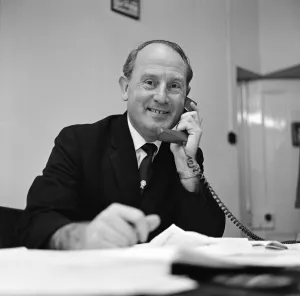 Football agent Ken Stanley reading a George Best annual. 18th February 1970 Football agent Ken Stanley reading a George Best annual. 18th February 1970