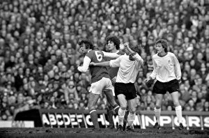 Images Dated 1st February 1975: Football: Arsenal F.C. (2) vs. Liverpool F.C. (0). Simpson of Arsenal with Keegan of