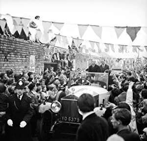 Supporters And Spectators Gallery: Football brothers Jack and Bobby Charlton are mobbed by crowds after leaving their