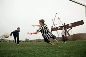Images Dated 15th February 1998: A football game takes place in front of the Angel of the North, Gateshead