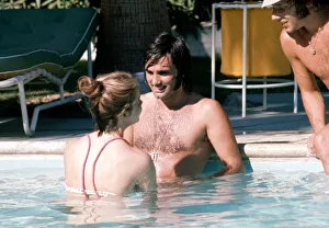 Footballer George Best relaxes with girlfriend Linda Joinett in a swimming pool in Palm Footballer George Best relaxes with girlfriend Linda Joinett in a swimming pool in Palm