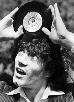 Images Dated 21st May 1979: Footballer Kevin Keegan with the record he has cut called Head over Heels in Love