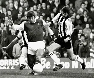 Footballer Malcolm MacDonald of Arsenal seen here tackling Stuart Barrowclough of Footballer Malcolm MacDonald of Arsenal seen here tackling Stuart Barrowclough of