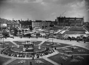 Fountains splashing merrily amid flowerbeds ablaze with colour Fountains splashing merrily amid flowerbeds ablaze with colour