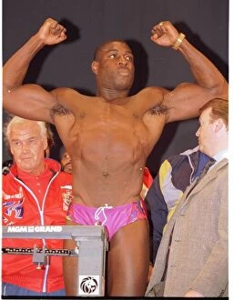 Images Dated 15th March 1996: Frank Bruno flexes his muscles at the weigh in. Ready for the fight against Mike Tyson in