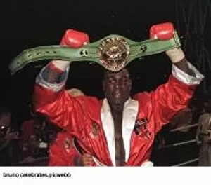 Images Dated 2nd September 1995: Frank Bruno holds up his WBC world title belt after he had beaten Oliver McCall in his