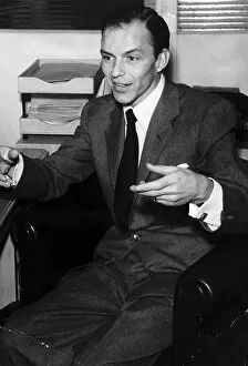 00162 Gallery: Frank Sinatra singer in his chair talking December 1951