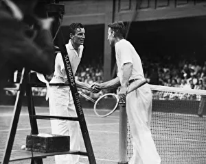 Fred Perry (GB) shakes hands with his opponent George Lott Fred Perry (GB) shakes hands with his opponent George Lott