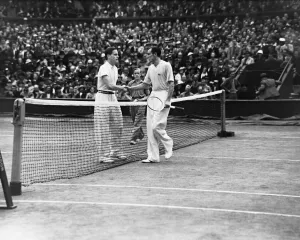 Fred Perry (right) and Gottfried von Cramm (left) of Germany shake hands at the net after Fred Perry (right) and Gottfried von Cramm (left) of Germany shake hands at the net after