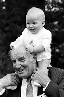 Images Dated 23rd June 1985: Fred Perry, former Wimbledon 3 times champion, with his grandson John Perry