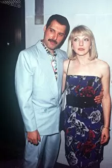 Images Dated 12th July 1986: Freddie Mercury and Mary Austin at Queen party at London Roof Gardens July 1986
