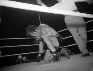 Freddie Mills takes a count during his fight with Bruce Woodcock 1949 Freddie Mills takes a count during his fight with Bruce Woodcock 1949