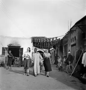 Two French actresses walk through the streets and market square in Marrakech Two French actresses walk through the streets and market square in Marrakech