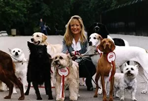 Images Dated 13th September 1993: Gaby Roslin TV Presenter with dogs who feature on the 1994 Prime dog food calendar in
