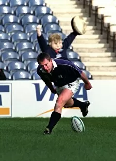 Images Dated 8th October 1999: Gary Armstrong of Scotland scoring a try October 1999 against Uruguay in rugby World Cup