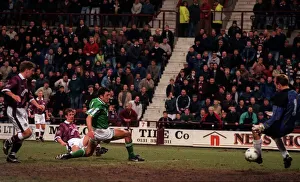 00229 Gallery: Gary MacKay Hearts football player scores goal past Hibs keeper Jim Leighton