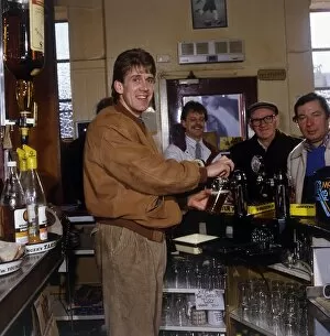 Gary MacKay working behind the bar March 1989