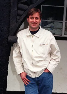 Gary Webster actor standing in archway white jacket denims hand in pocket April 1997 Gary Webster actor standing in archway white jacket denims hand in pocket April 1997