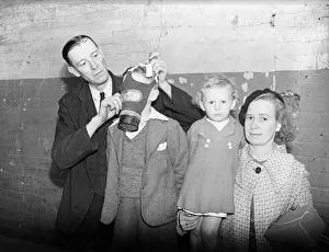 Gas masks are distributed and fitted at the Broad Street offices of Birmingham's A.R Gas masks are distributed and fitted at the Broad Street offices of Birmingham's A.R