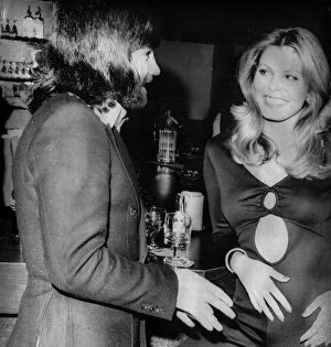 Images Dated 21st January 1974: George Best with American girl Marjorie Wallace, Miss World at his Slack Alice night club