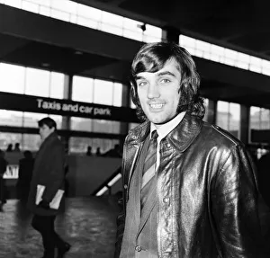 George Best arrives at Euston Station with members of Manchester United Football team for George Best arrives at Euston Station with members of Manchester United Football team for