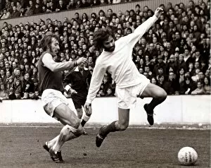 Images Dated 3rd April 1971: George Best Football Player - April 1971 is tackled by Billy Bond of West Ham