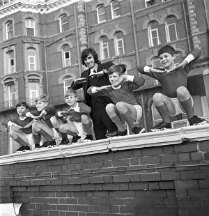 George Best with kids from a Children's Home pictured outside the home George Best with kids from a Children's Home pictured outside the home