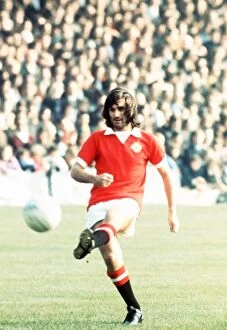 George Best Manchester United Footballer kicking ball 1973