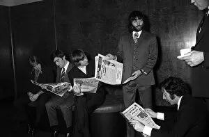 George Best with Manchester United team mates April 1971 reading the papers