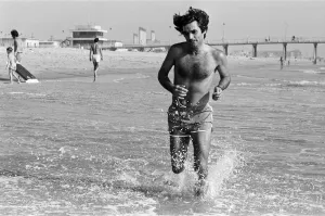 George Best putting in extra training running through the surf and sand at Hermosa Beach George Best putting in extra training running through the surf and sand at Hermosa Beach