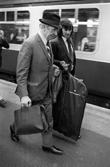 Images Dated 19th August 1971: George Best and Sir Matt Busby on railway platform 1971 after George had been sent