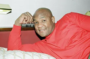 George Foreman pictured in a hotel room. 22nd September 1990 George Foreman pictured in a hotel room. 22nd September 1990