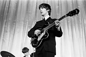 George Harrison on Stage November 1964. Art Prints, Posters