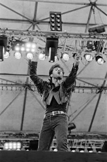 Images Dated 28th June 1986: George Michael of Wham ! gets the crowd going at The Farewell Concert at Wembley Stadium