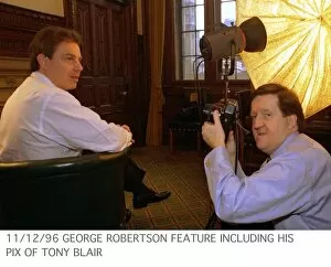 Images Dated 11th December 1996: George Robertson MP feature including his picture of Tony Blair sitting in green chair