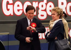 George Robertson MP looking at his watch as he waits for the arrival of Tony Blair at George Robertson MP looking at his watch as he waits for the arrival of Tony Blair at