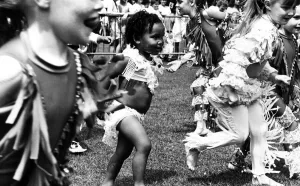 00614 Gallery: Getting carried away by the dancing at the Garston Carnival is two year old Felicia Zenko