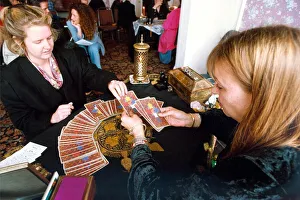 Someone getting their fortune told by tarot cards in 1994 Someone getting their fortune told by tarot cards in 1994