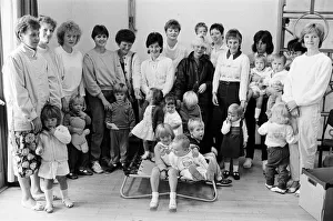 Getting to know each other are these mothers and toddlers who met at a new club held for Getting to know each other are these mothers and toddlers who met at a new club held for