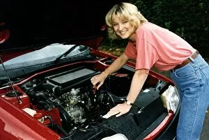 Images Dated 30th September 1992: Gillian Taylforth actress Eastenders star looking under bonnet of a Citroen diesel prior