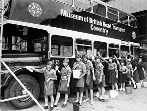 Girl Guides faced a giant-sized problem when they volunteered to wash a double-decker bus