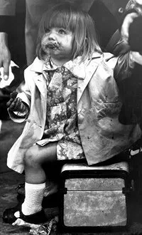 Girl waiting for the train in Belfast. 15th July 1972