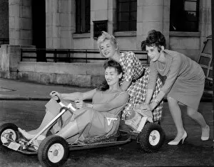 Related Images Gallery: Three girls from the Windmill Theatre in London play around on a go kart, July 1960