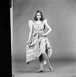 Glamour girl Geraldine June wearing a pinafore. January 1975 75-00316-007