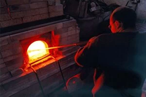 Images Dated 1st November 1997: Glass blower Andy Murphy works on one of the furnaces in November 1997