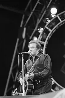Images Dated 26th June 1994: Glastonbury Festival 1994. Pictures shows Johnny Cash performing on The Pyramid
