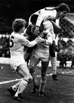 Glenn Hoddle leaps on top of his teamates after Spurs had scored the winner against